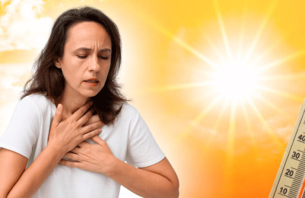 Mulher sofrendo com problemas respiratórios no calor
